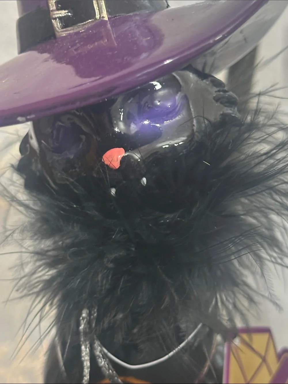 Eerie charm black cat on pumpkin decor
